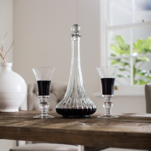 Red wine and decanter on dining table
