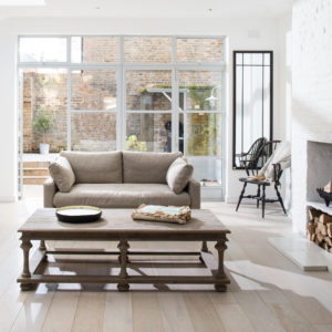 Light and neutral sitting room with coffee table 