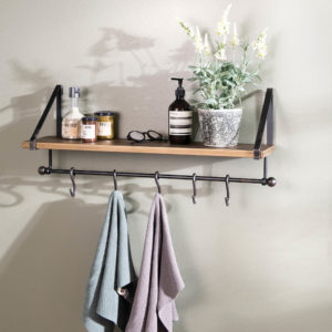 Bathroom shelf with towels and soap